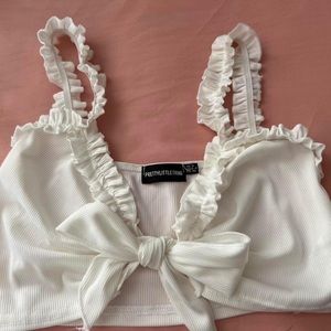 Pretty little thing cropped tie top.